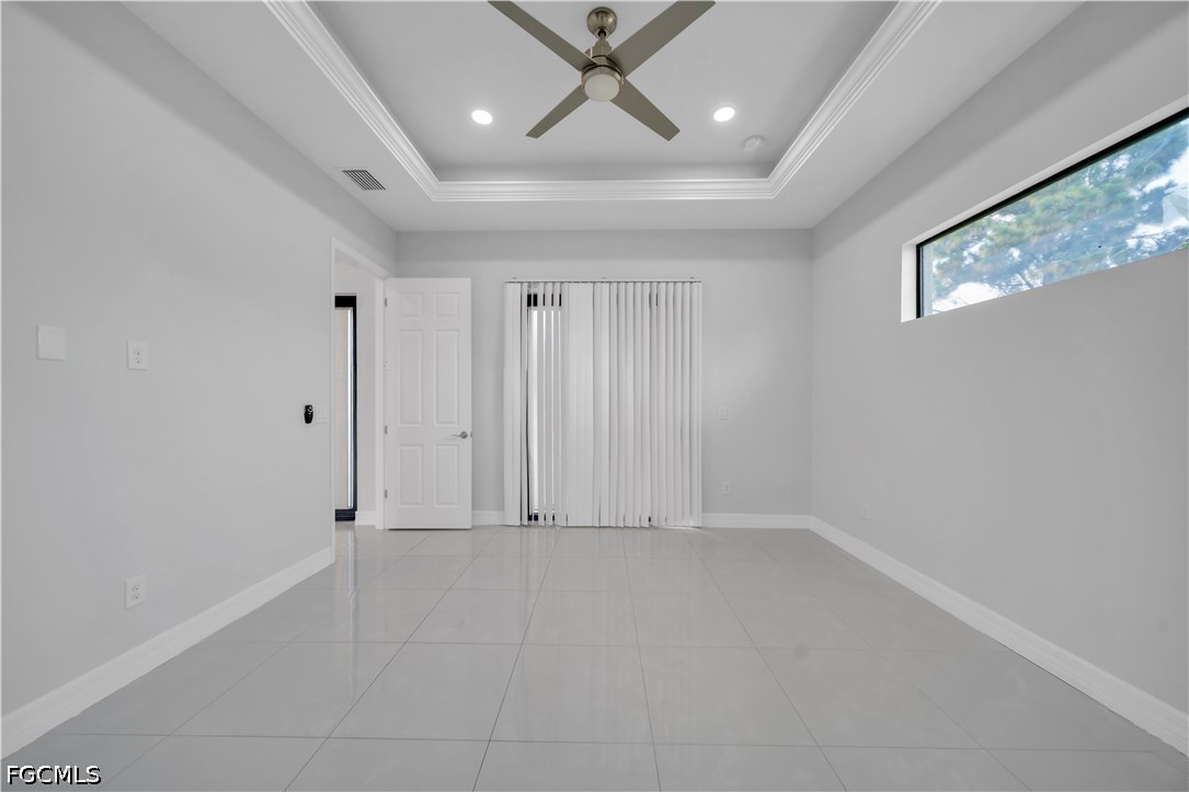 3509 38th Street Southwest Lehigh Acres, FL 33976 - Photo 20 of 47 an empty room with windows and closet