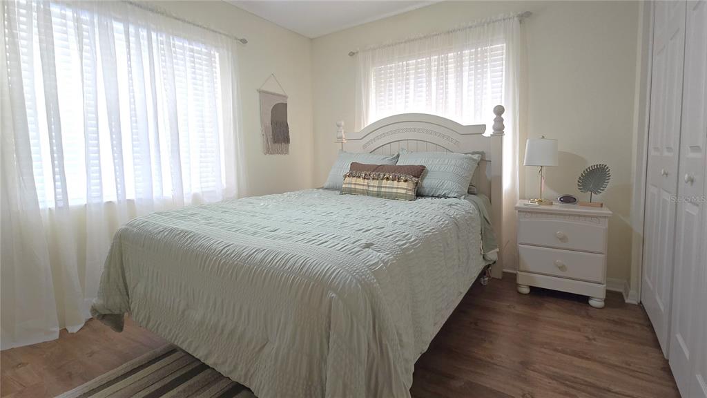 6501 Stone River Road, Unit 201 Bradenton, FL 34203 - Photo 12 of 18 a bedroom with a bed and a window