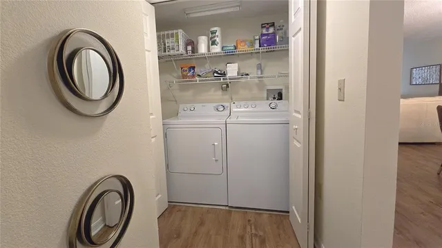 a utility room with dryer and washer