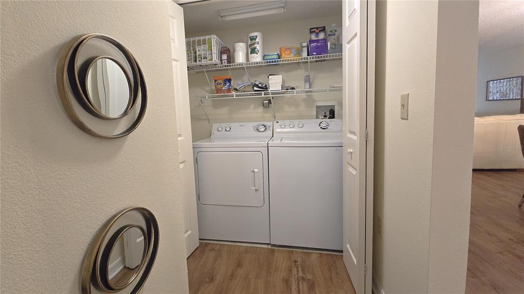 6501 Stone River Road, Unit 201 Bradenton, FL 34203 - Photo 15 of 18 a utility room with dryer and washer