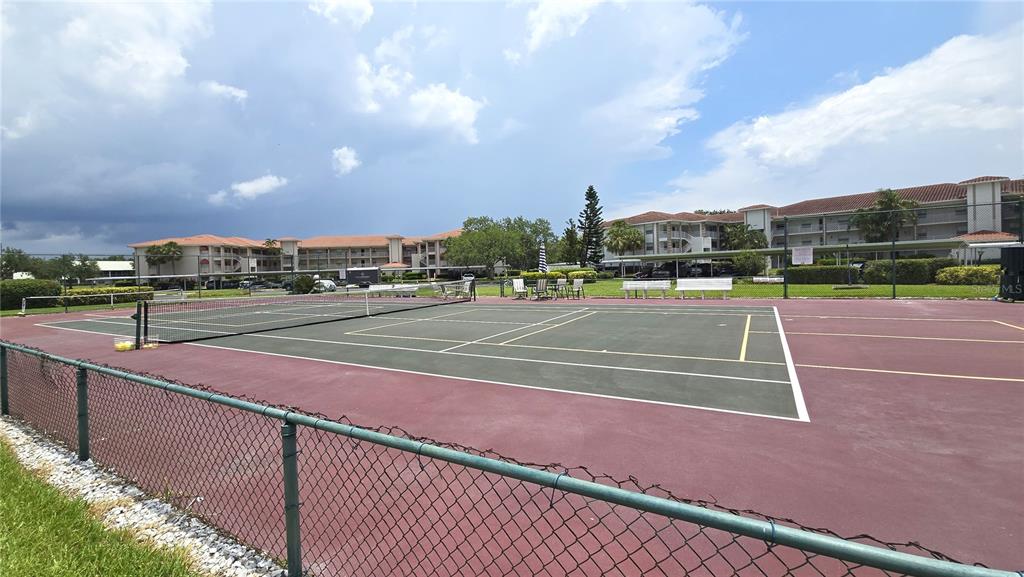 6501 Stone River Road, Unit 201 Bradenton, FL 34203 - Photo 18 of 18 a view of a tennis court