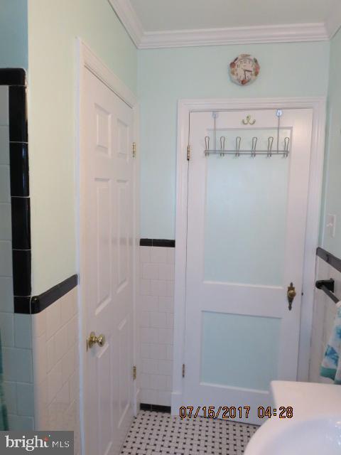 124 Granada Road Pasadena, MD 21122 - Photo 14 of 41 MAIN FLOOR FULL BATHROOM