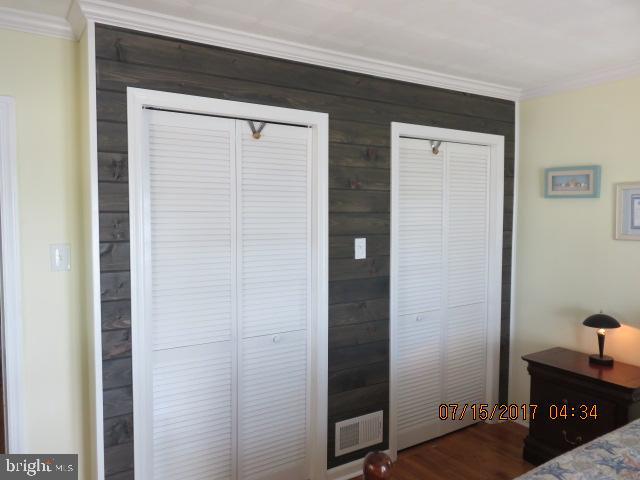 124 Granada Road Pasadena, MD 21122 - Photo 16 of 41 MAIN FLOOR BEDROOM WITH SPACIOUS CLOSET SPACE