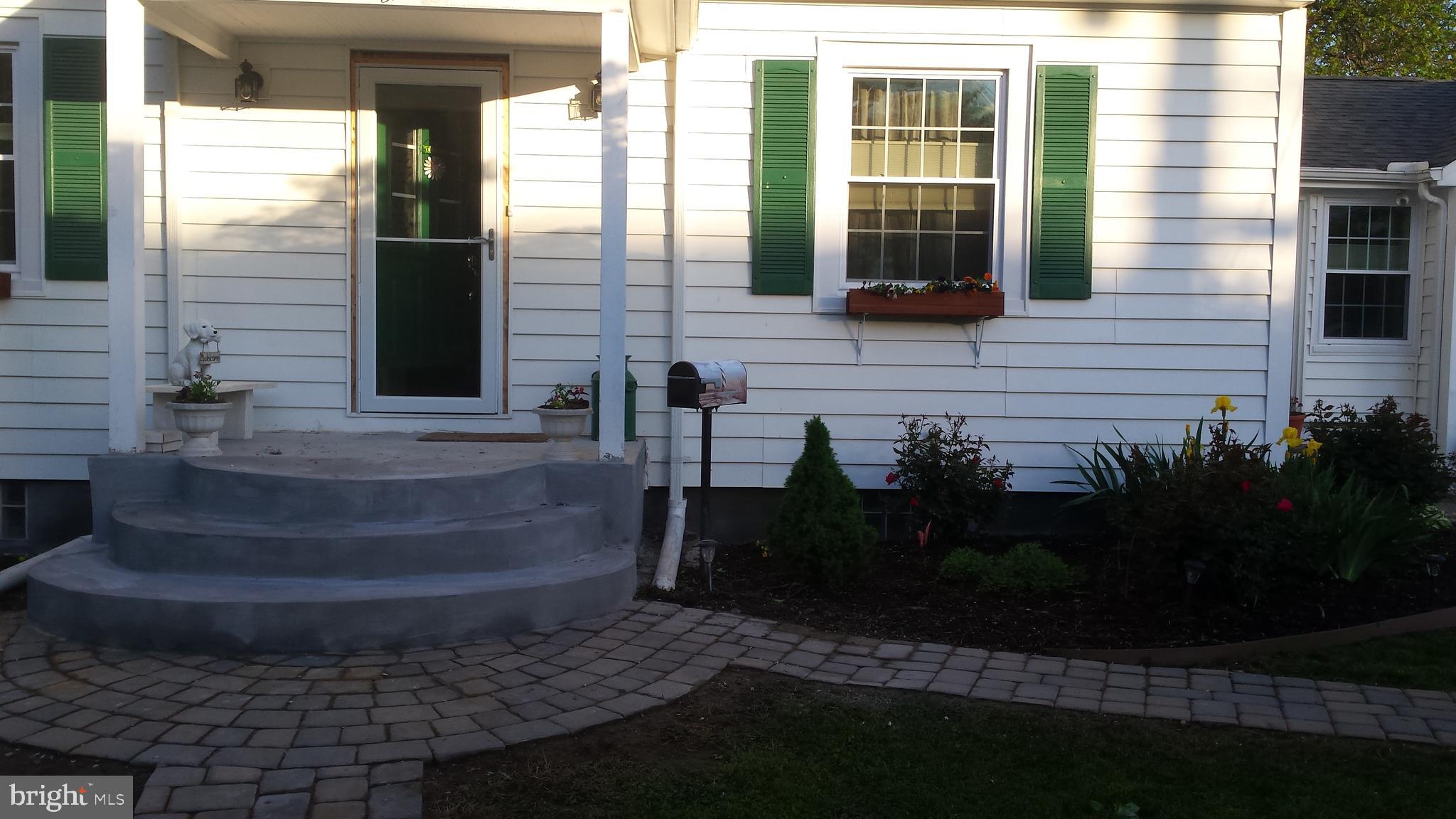 124 Granada Road Pasadena, MD 21122 - Photo 3 of 41 NEWER CEDAR RIDGE SIDING/PAVER WALKWAY