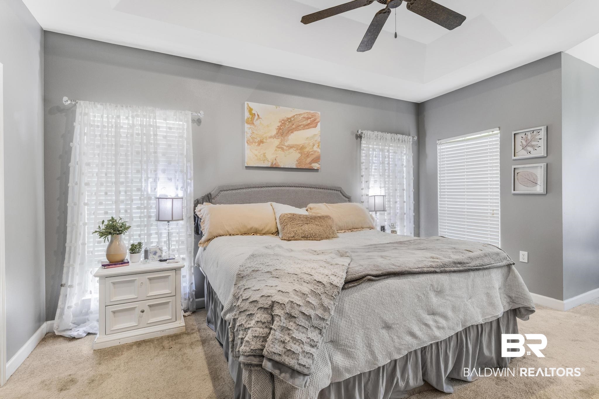35814 Delvan Lane Bay Minette, AL 36507 - Photo 37 of 53 Carpeted bedroom featuring a tray ceiling, ceiling fan, and two windows with blinds