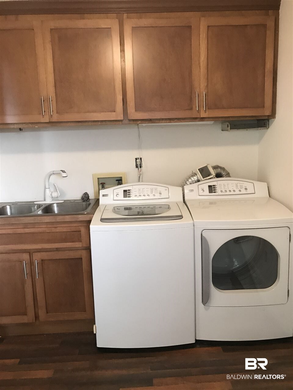 8901 Bay View Drive Foley, AL 36535 - Photo 16 of 30 Refrigerator also remains. Cabinets, sink, space!