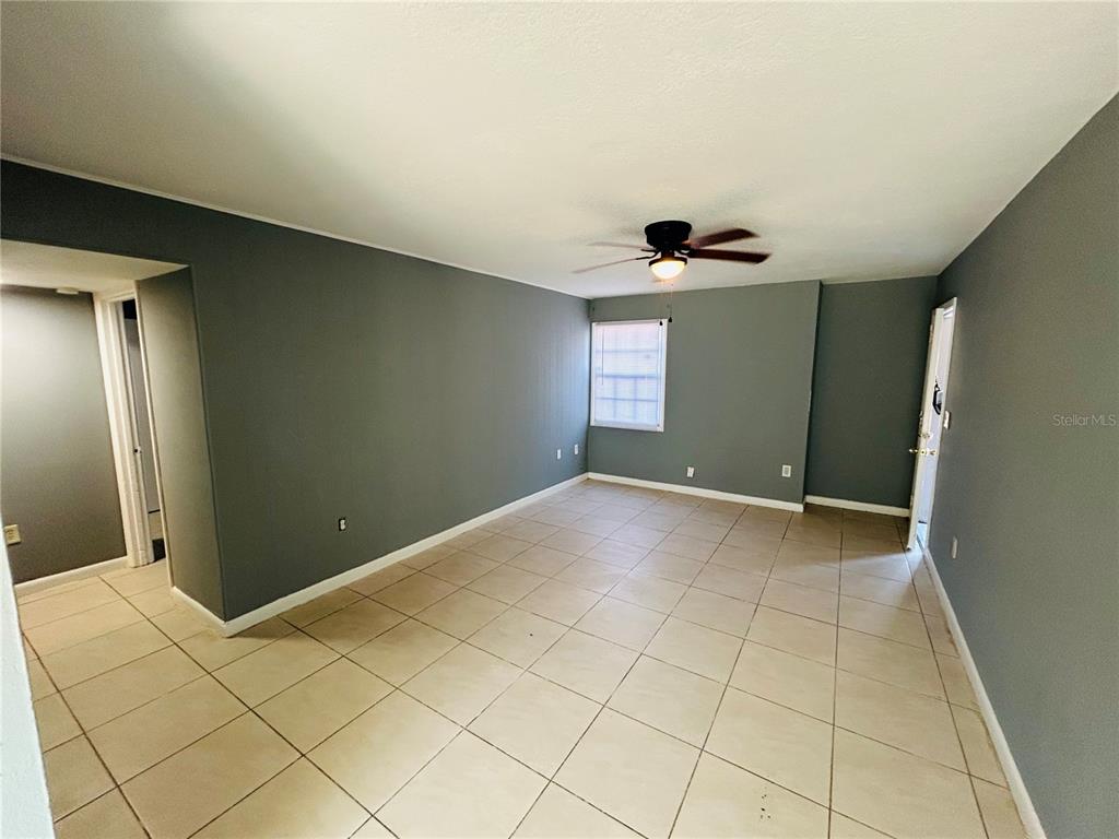 2785 L B McLeod Road, Unit B Orlando, FL 32805 - Photo 6 of 11 a view of an empty room and window