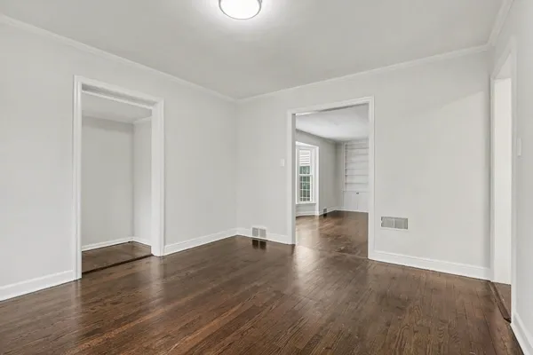 a view of a livingroom with wooden floor