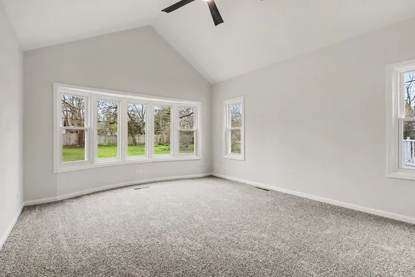an empty room with windows