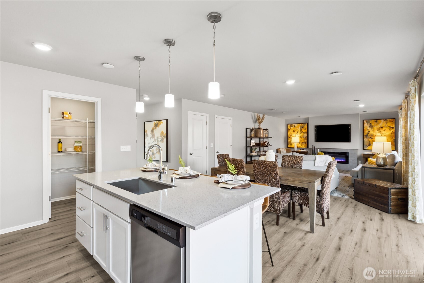 13434 323rd Avenue Southeast Sultan, WA 98294 - Photo 11 of 28 a kitchen with stainless steel appliances kitchen island granite countertop a sink and cabinets