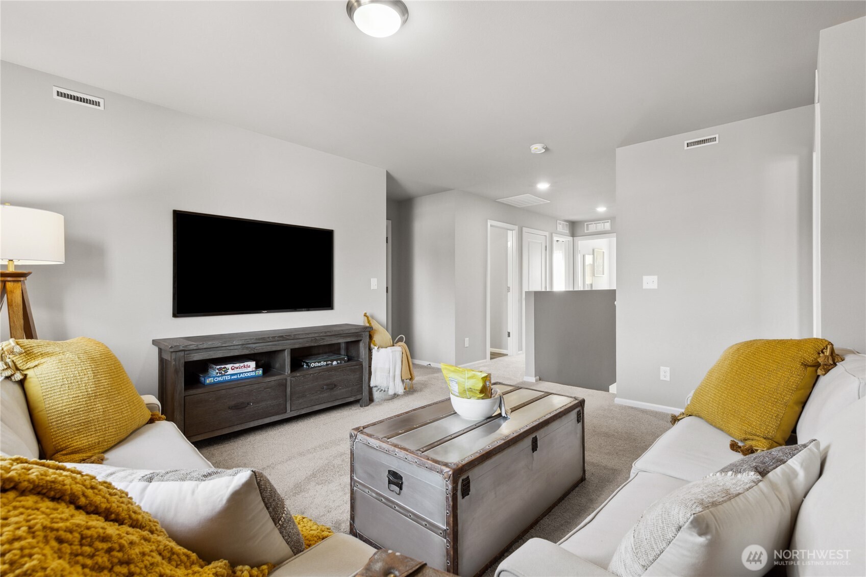 13434 323rd Avenue Southeast Sultan, WA 98294 - Photo 22 of 28 a living room with furniture and a flat screen tv