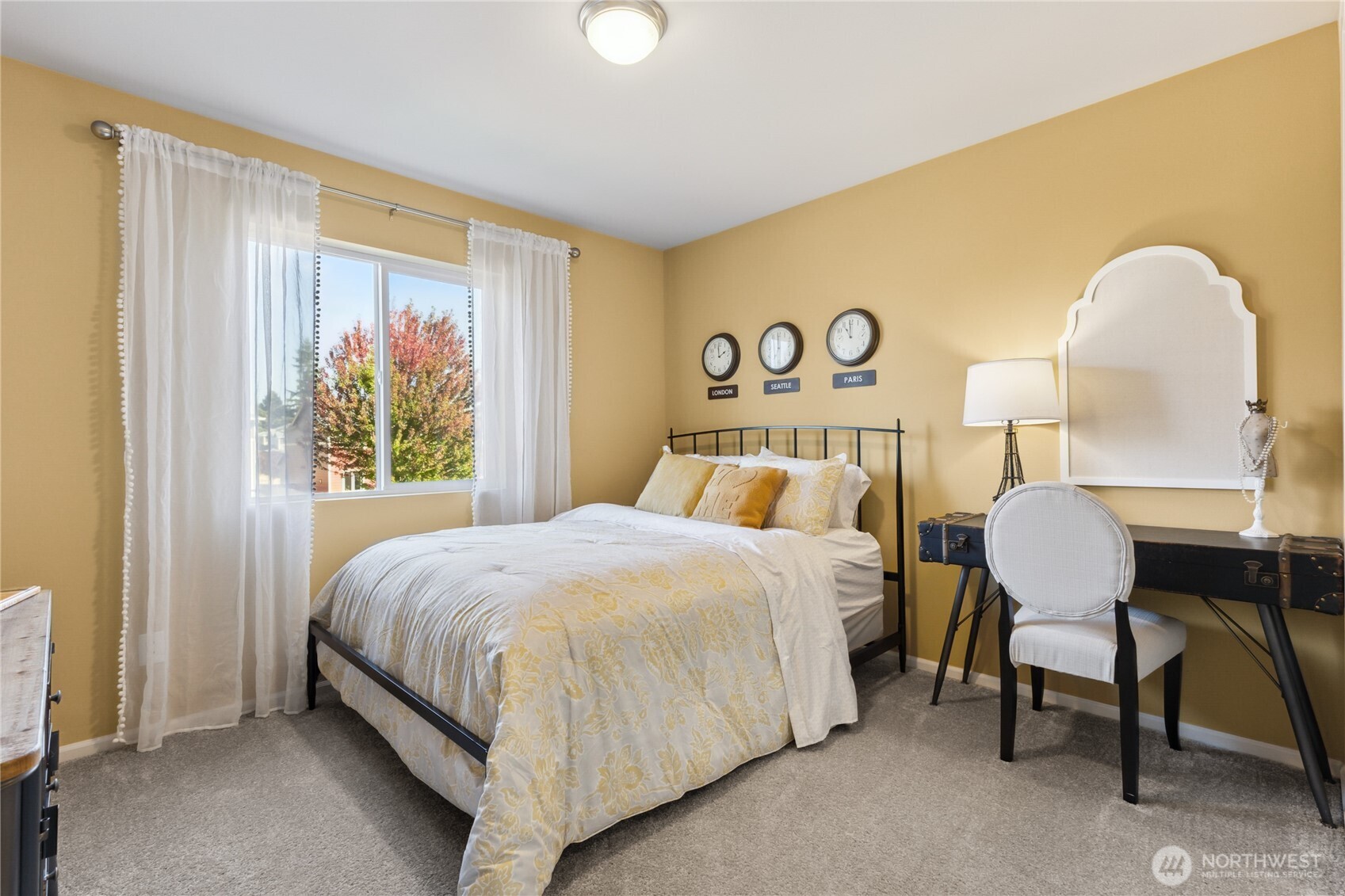 13434 323rd Avenue Southeast Sultan, WA 98294 - Photo 23 of 28 a bedroom with a bed and a table