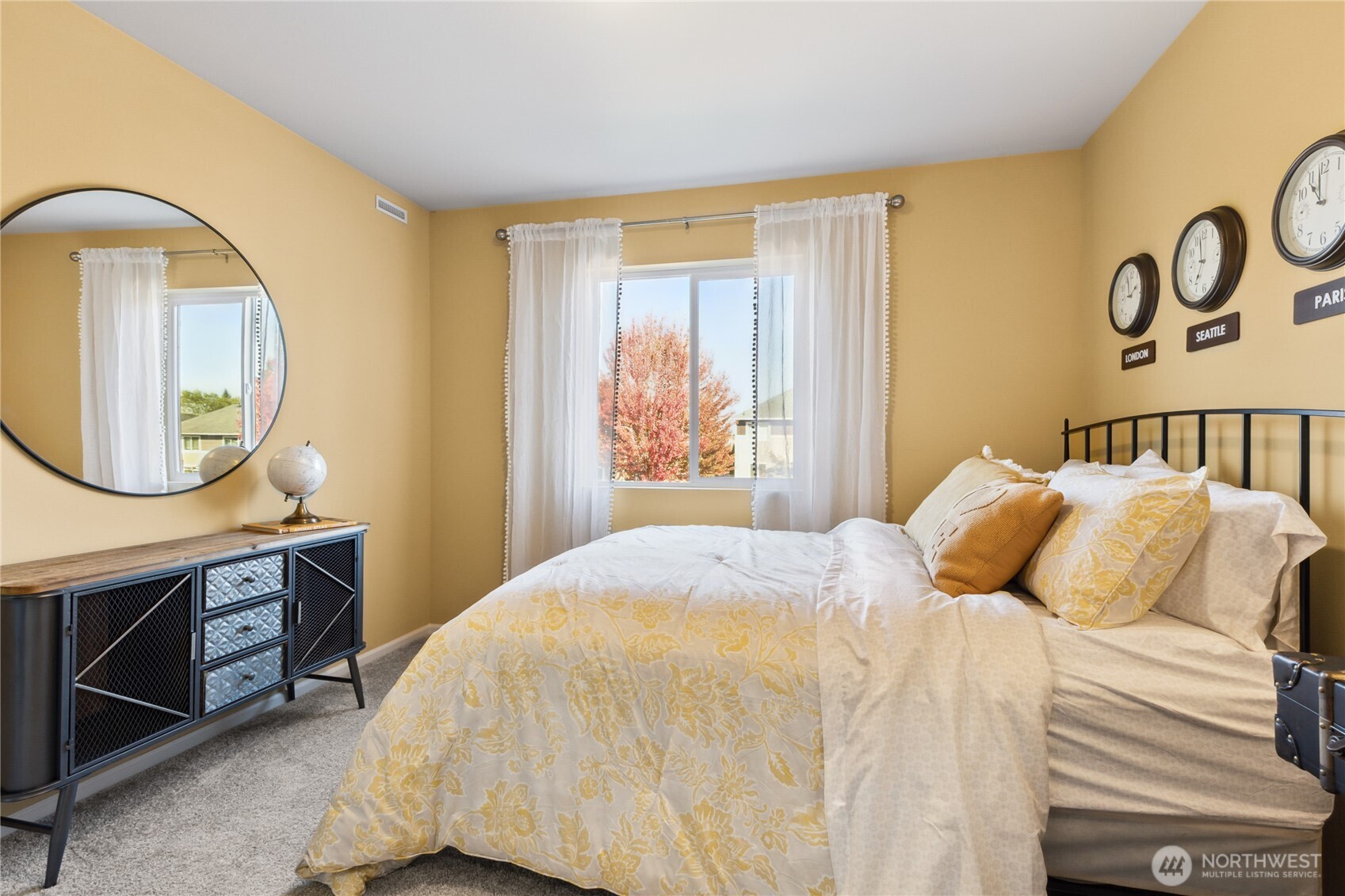 13434 323rd Avenue Southeast Sultan, WA 98294 - Photo 24 of 28 a bedroom with a bed and a mirror on dresser