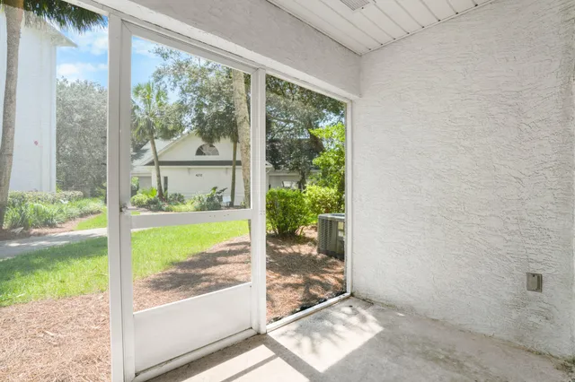a view of a swimming pool with a lounge chairs