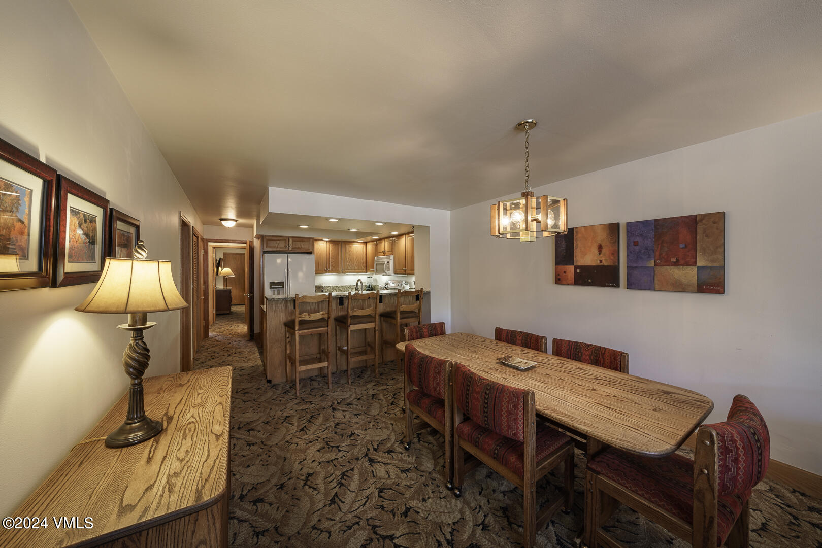707 West Lionshead Circle, Unit 118 Vail, CO 81657 - Photo 11 of 29 a view of a dining room with furniture