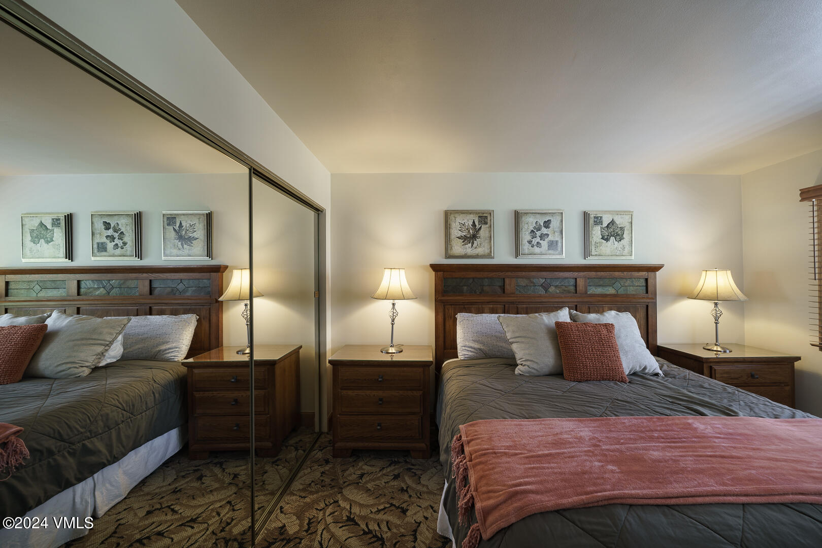 707 West Lionshead Circle, Unit 118 Vail, CO 81657 - Photo 20 of 29 a bedroom with a bed and a night stand