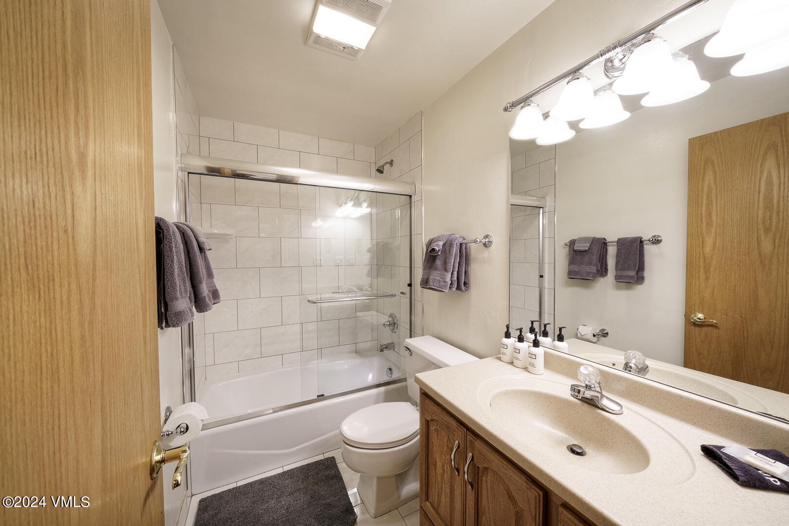 707 West Lionshead Circle, Unit 118 Vail, CO 81657 - Photo 23 of 29 a bathroom with a sink a toilet and shower