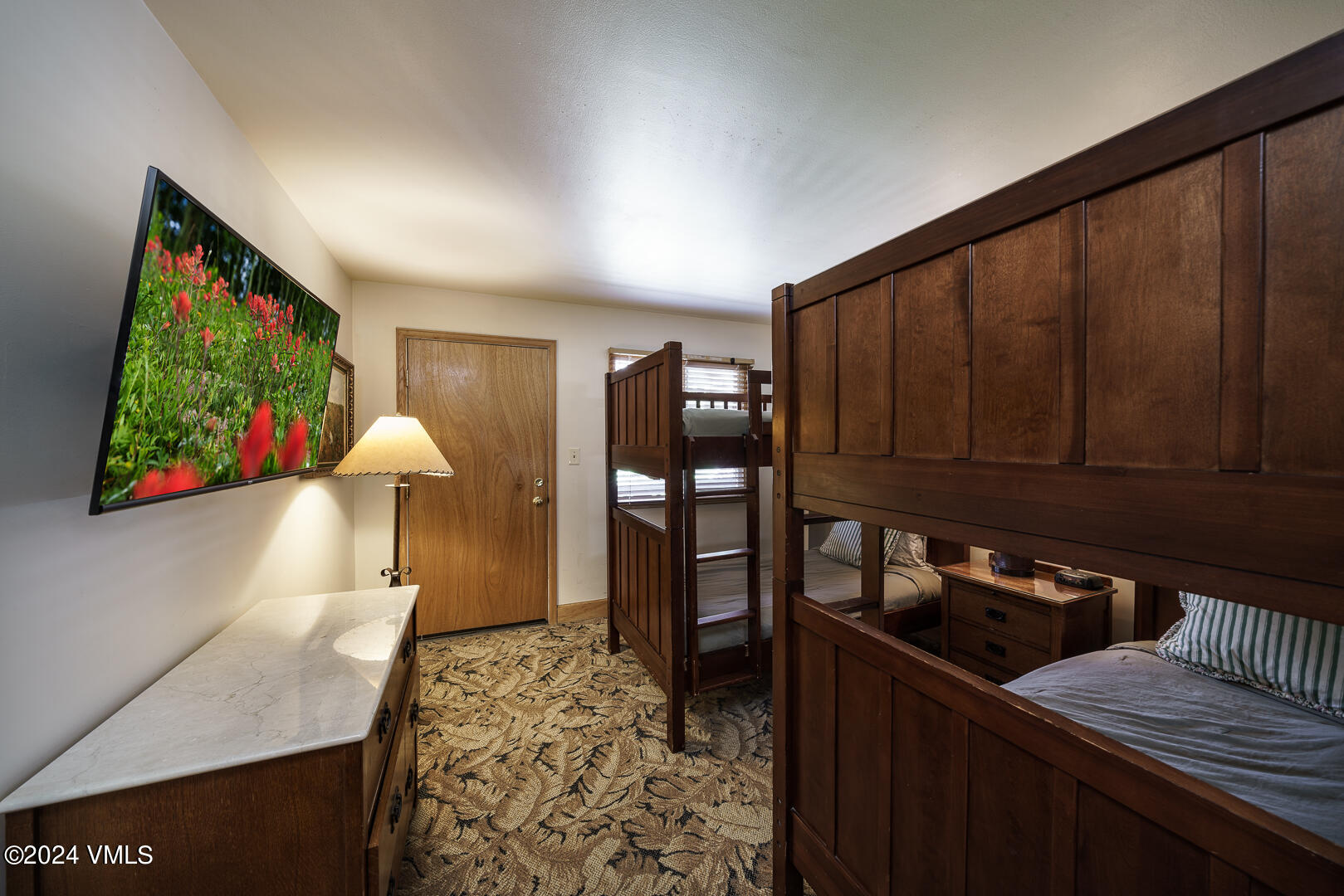 707 West Lionshead Circle, Unit 118 Vail, CO 81657 - Photo 24 of 29 a living room with furniture