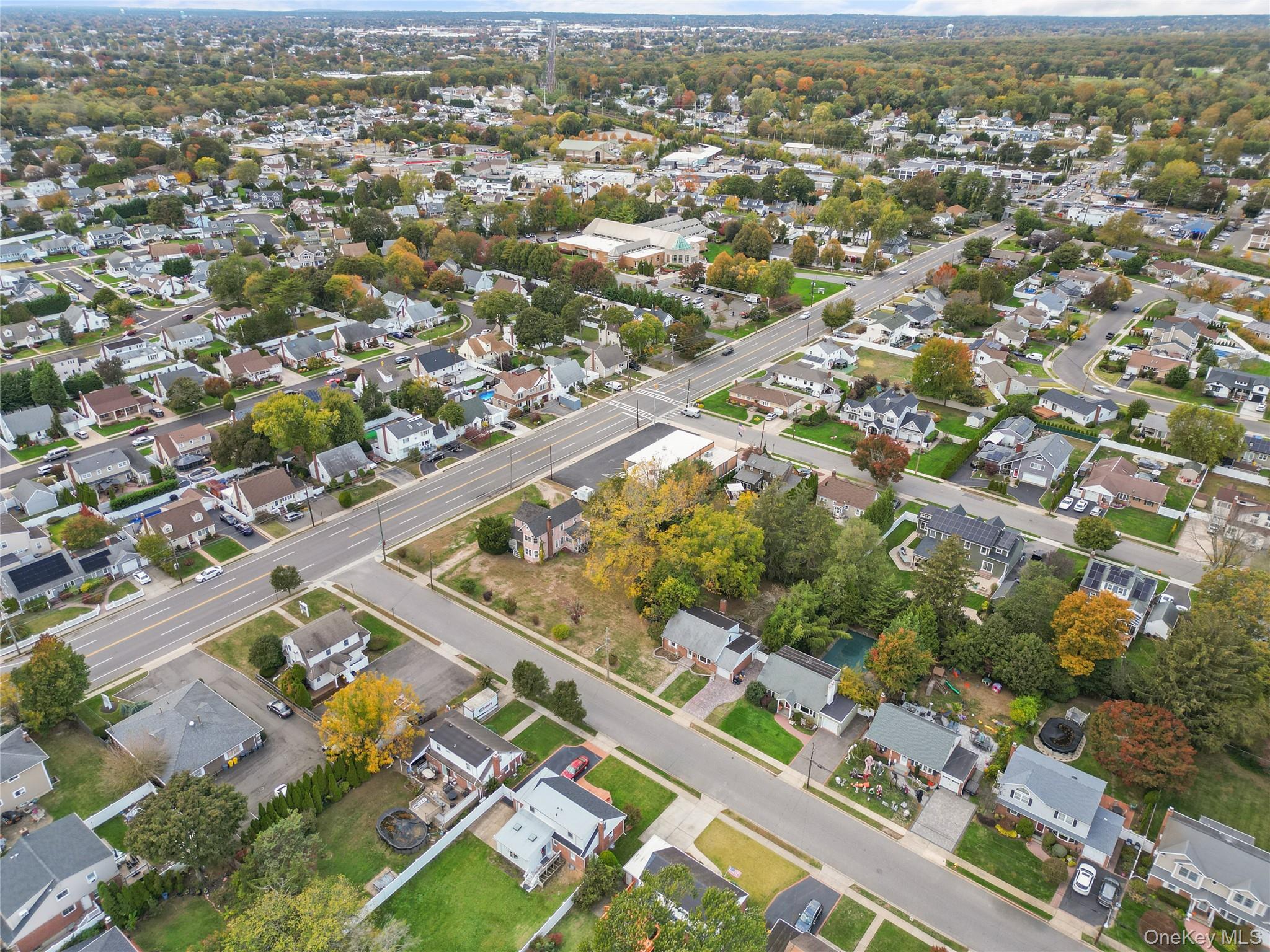 9 Tudor Road Farmingdale, NY 11735 - Photo 12 of 12 an aerial view of residential building with parking space