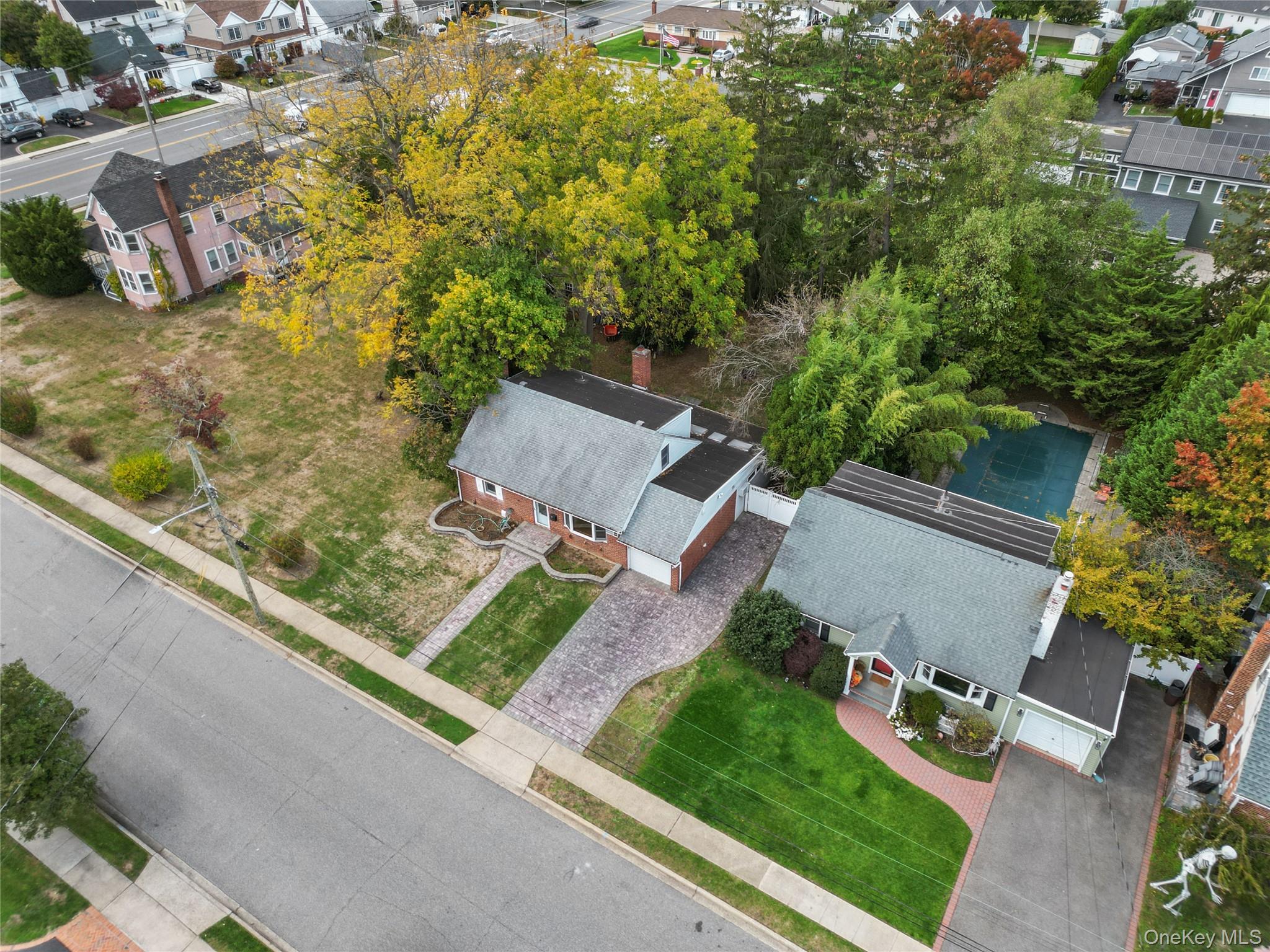 9 Tudor Road Farmingdale, NY 11735 - Photo 8 of 12 an aerial view of residential house with outdoor space