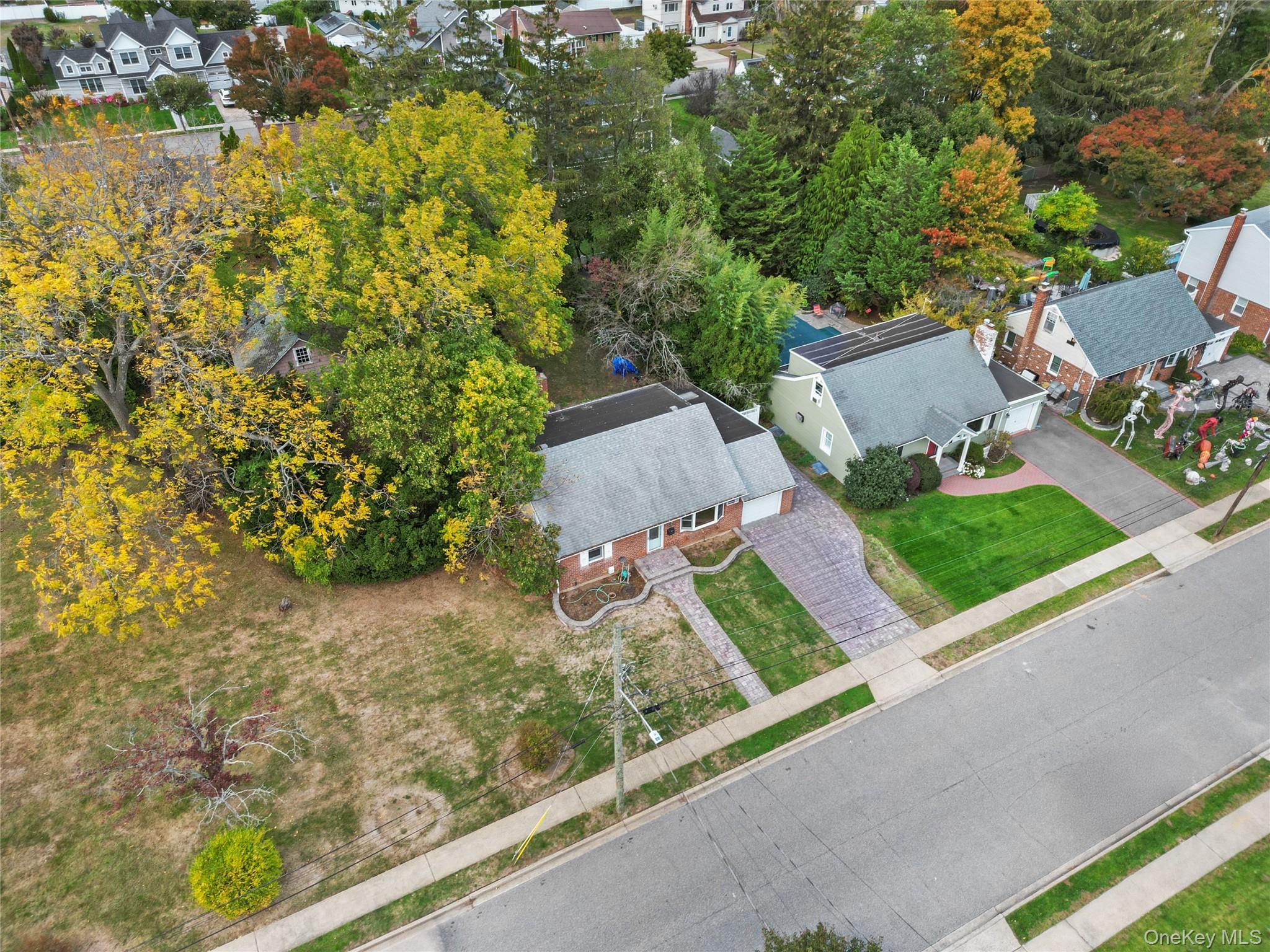 9 Tudor Road Farmingdale, NY 11735 - Photo 9 of 12 an aerial view of residential house with outdoor space