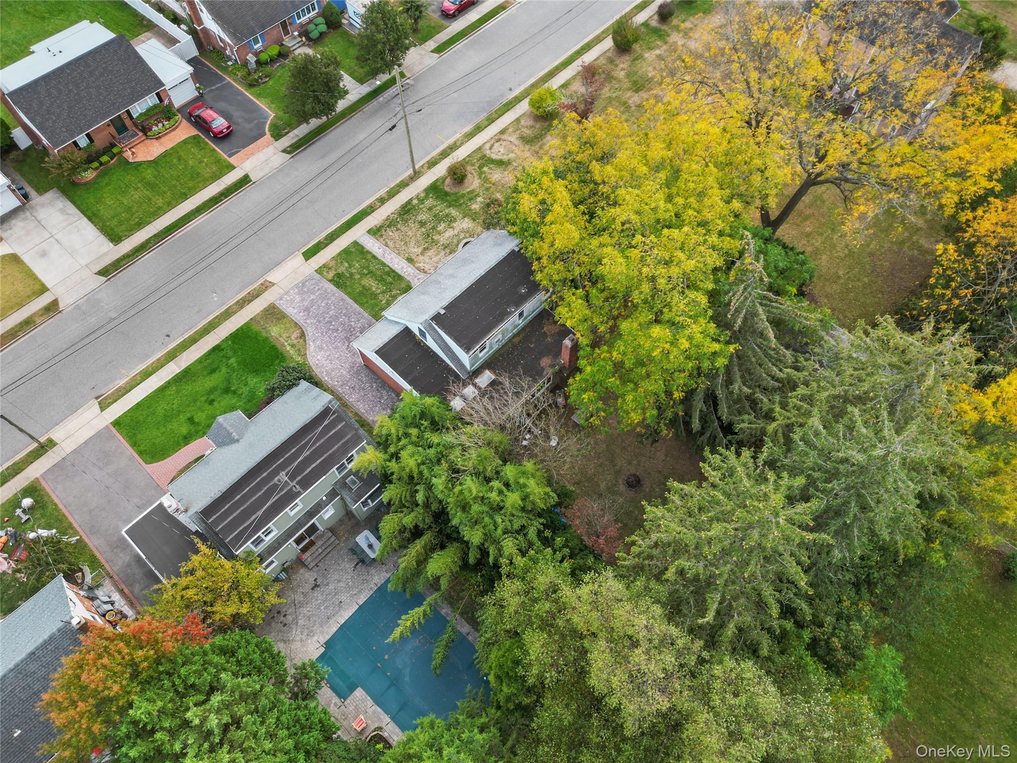 9 Tudor Road Farmingdale, NY 11735 - Photo 10 of 12 a view of a yard with a house