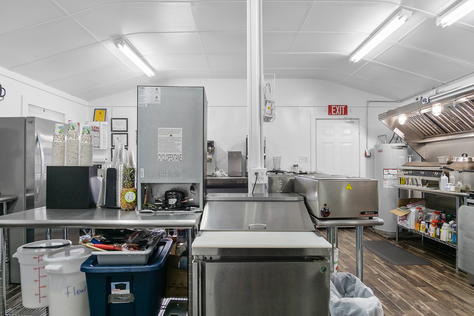 1136 Highway 87 Crystal Beach, TX 77650 - Photo 16 of 33 a kitchen with a stove and a refrigerator