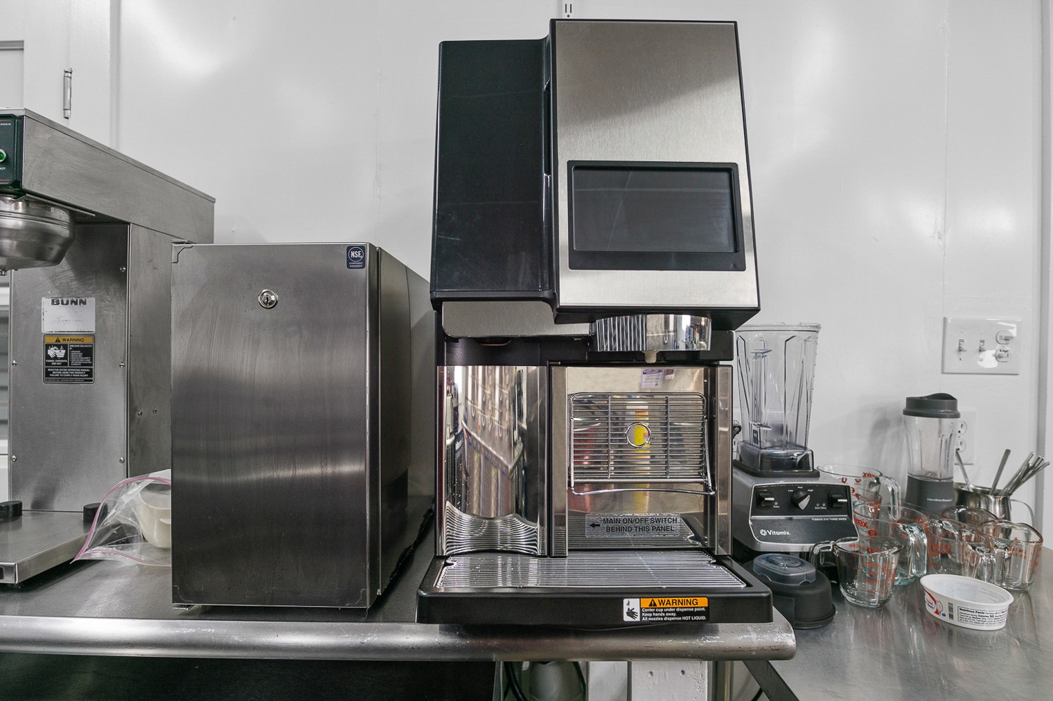 1136 Highway 87 Crystal Beach, TX 77650 - Photo 5 of 33 a kitchen with refrigerator and window