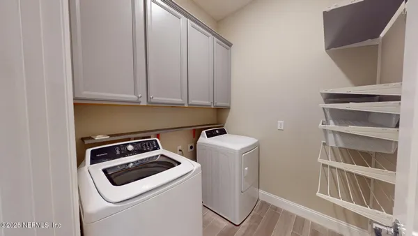 a bathroom with a sink and a shower