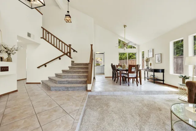 a kitchen with stainless steel appliances granite countertop sink stove and cabinets