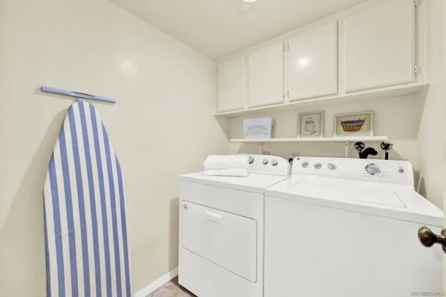 a bedroom with a bed chair and window