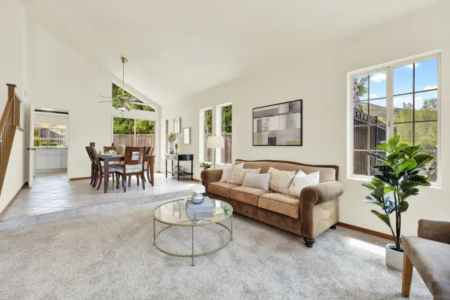 a view of entryway and hall with dining room