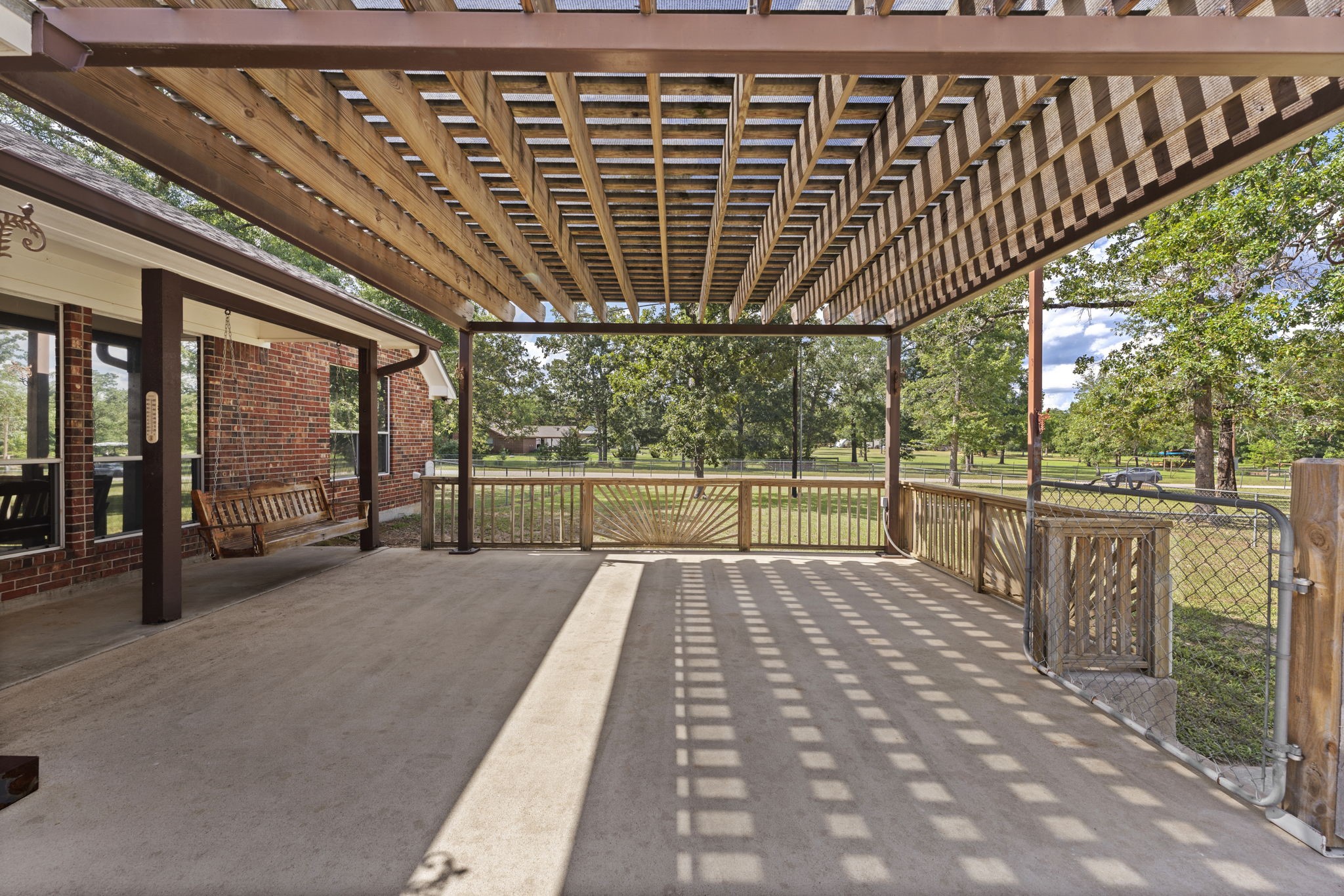 11534 Clint Parker Road Conroe, TX 77303 - Photo 18 of 50 a view of porch with a pathway
