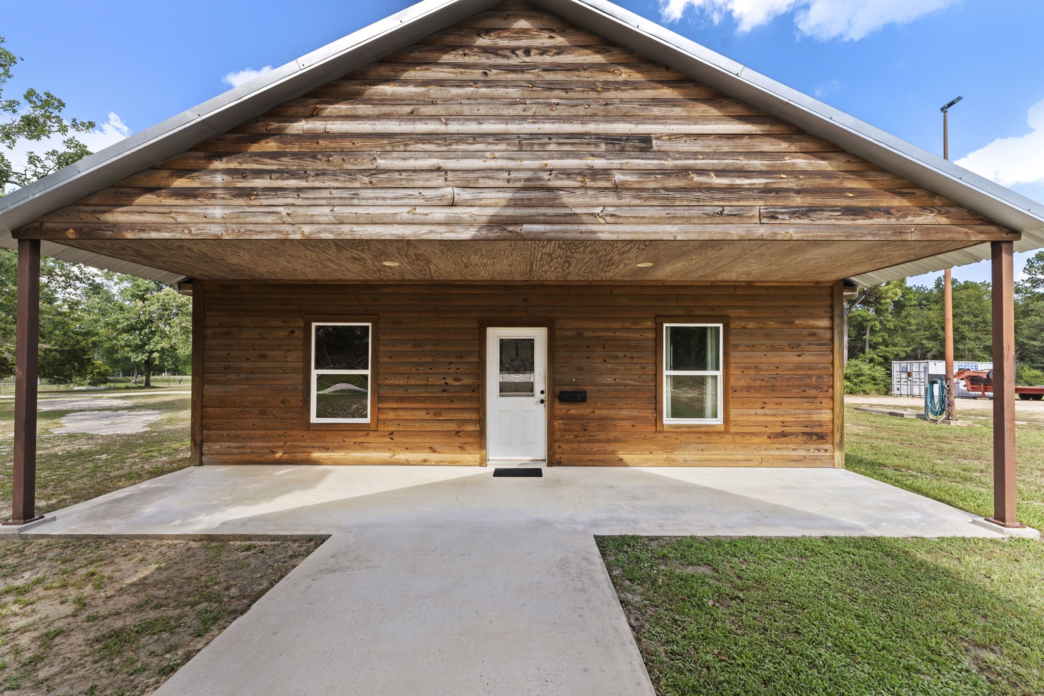 11534 Clint Parker Road Conroe, TX 77303 - Photo 25 of 50 front view of house with a yard