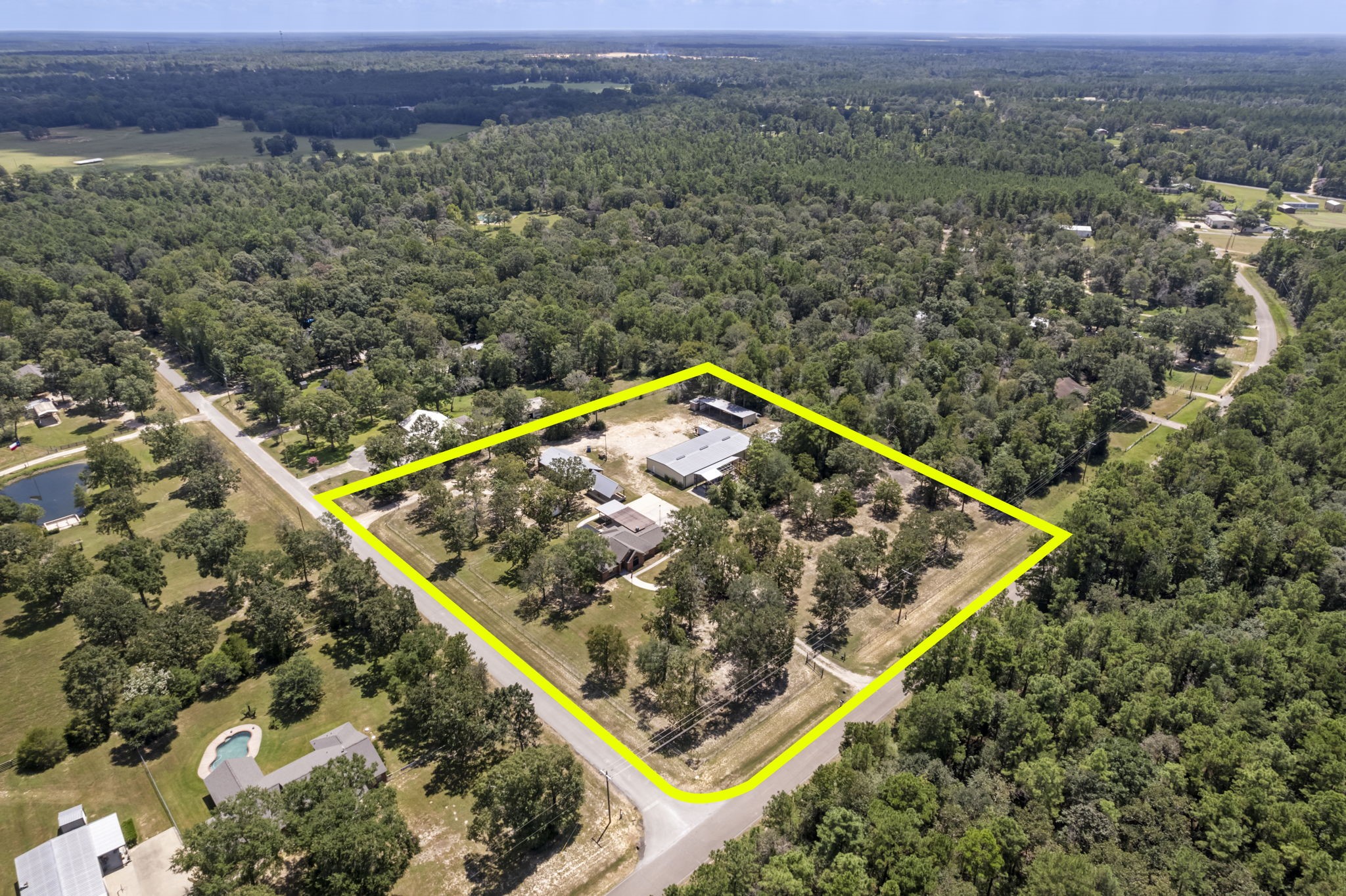 11534 Clint Parker Road Conroe, TX 77303 - Photo 3 of 50 a view of a small pool with a mountain