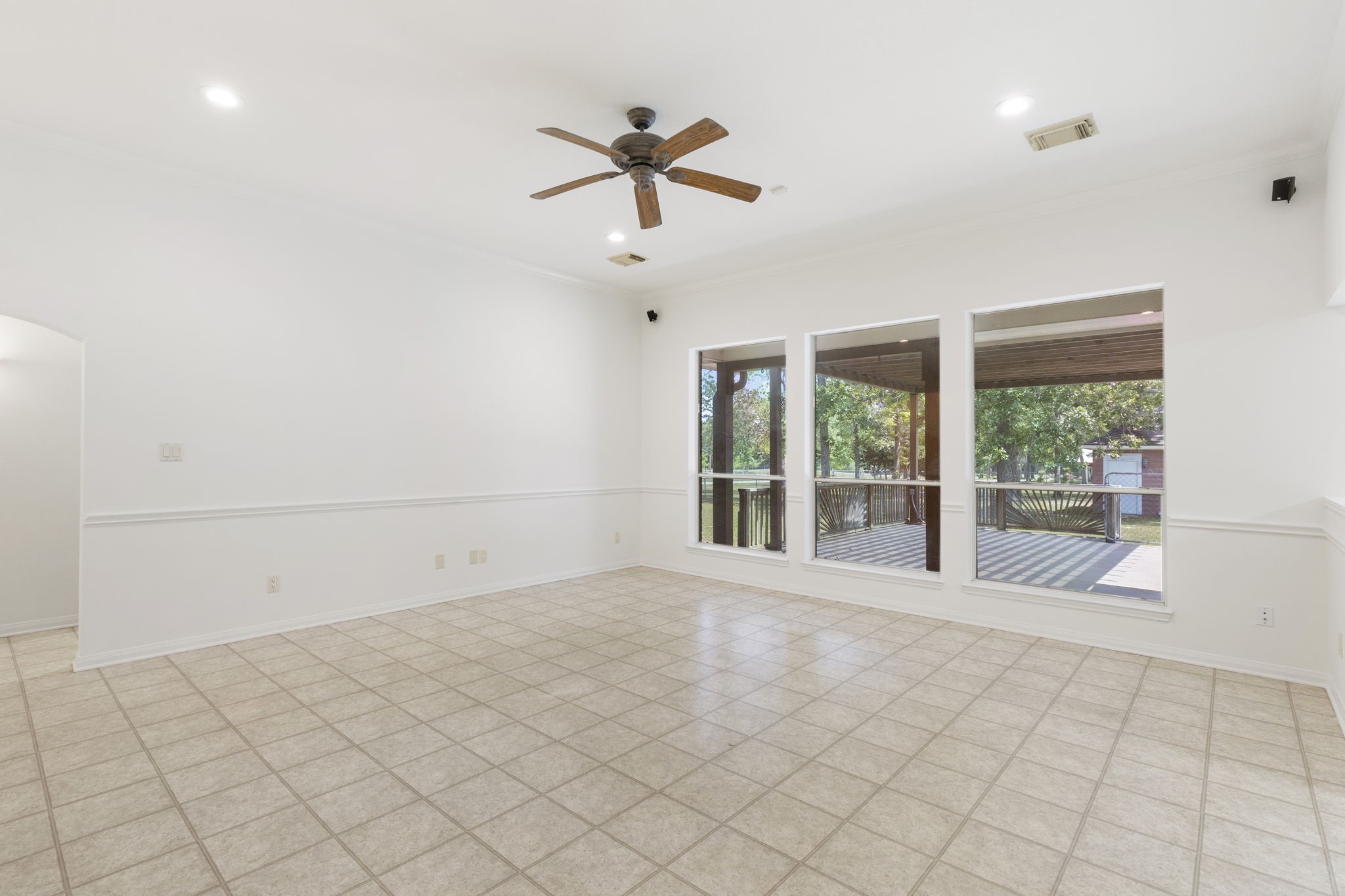 11534 Clint Parker Road Conroe, TX 77303 - Photo 9 of 50 a view of an empty room with a window