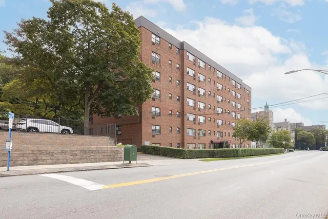 a view of a building with a street
