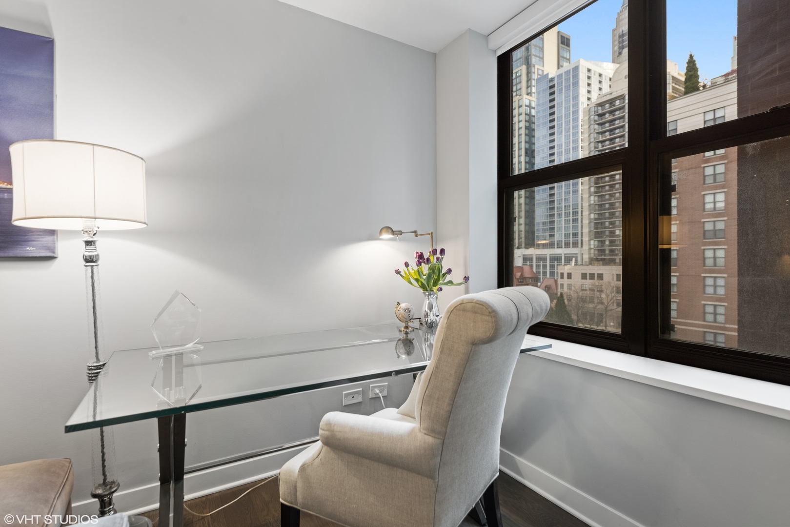 55 West Delaware Place, Unit 613 Chicago, IL 60610 - Photo 20 of 29 a view of a room with furniture and a window