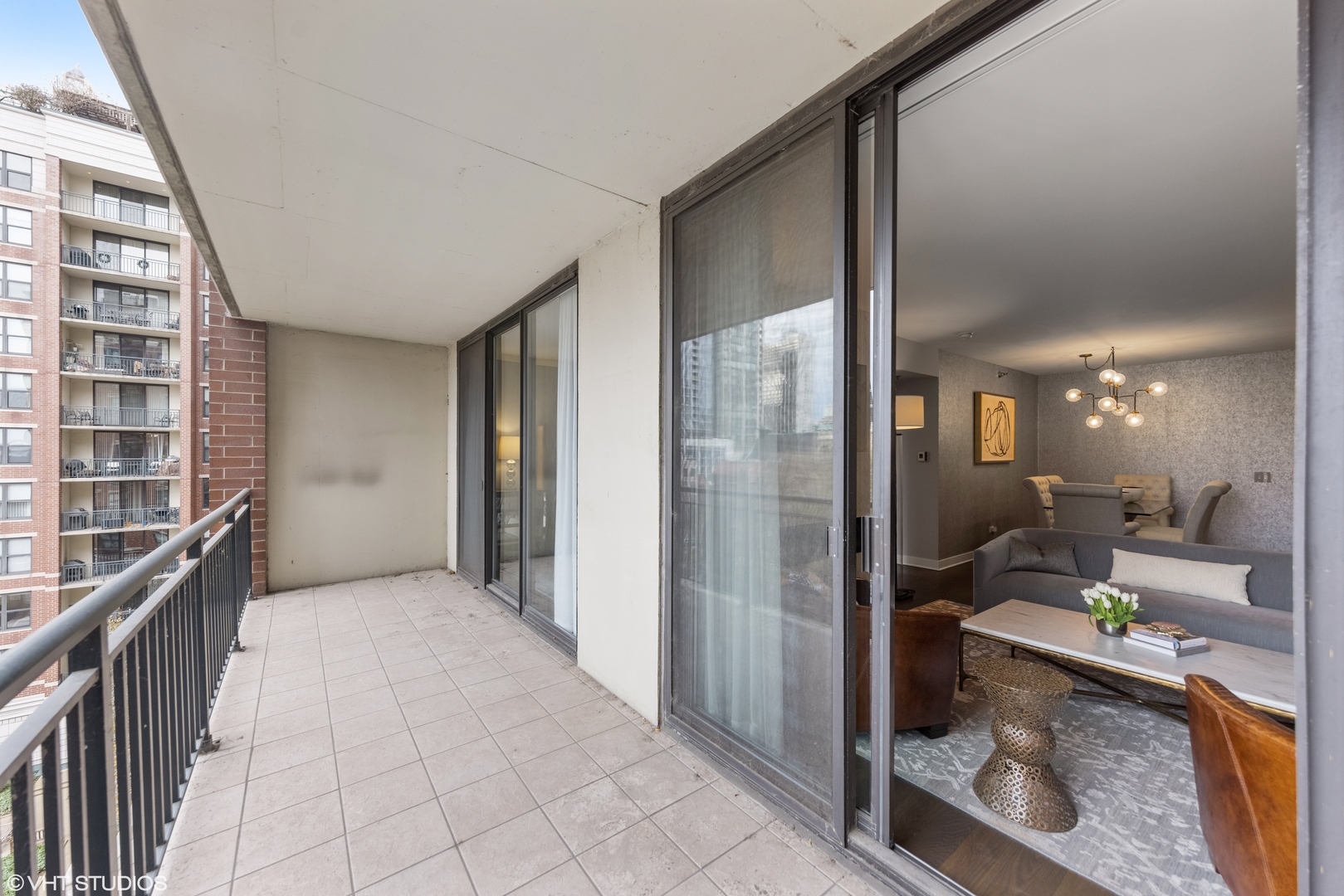 55 West Delaware Place, Unit 613 Chicago, IL 60610 - Photo 25 of 29 a view of a hallway and a livingroom with furniture