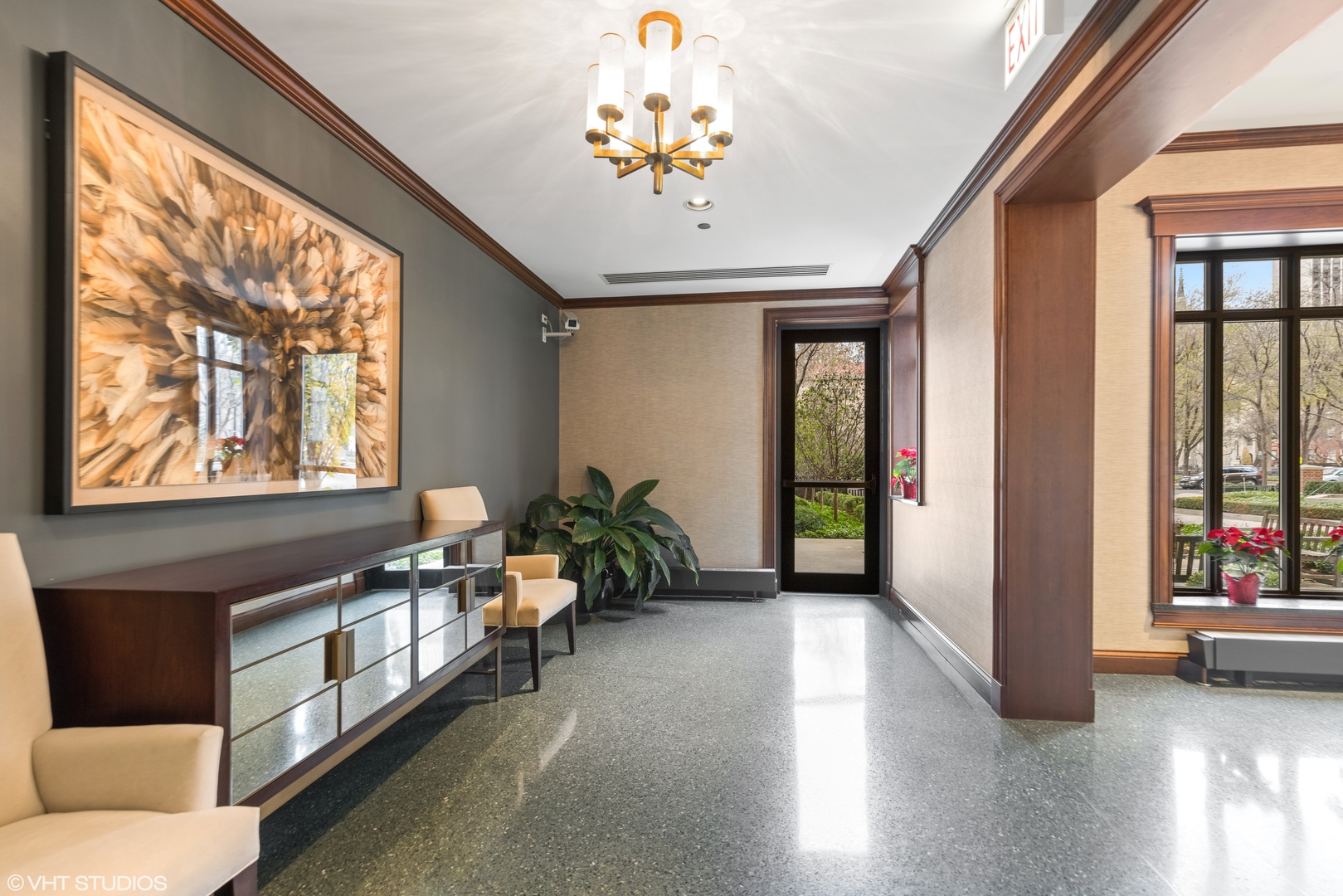 55 West Delaware Place, Unit 613 Chicago, IL 60610 - Photo 26 of 29 a living room with furniture and a large window