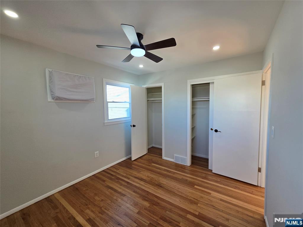 691 9th Street, Unit 2 Secaucus, NJ 07094 - Photo 11 of 16 a view of empty room with wooden floor and fan