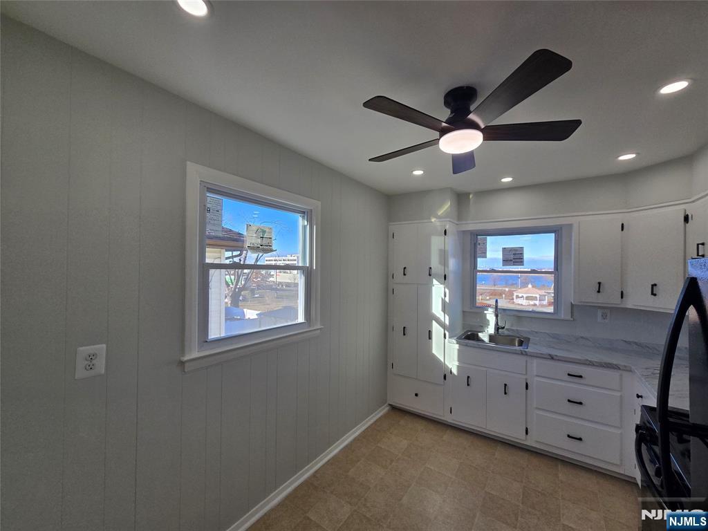 691 9th Street, Unit 2 Secaucus, NJ 07094 - Photo 5 of 16 a view of a workspace with furniture