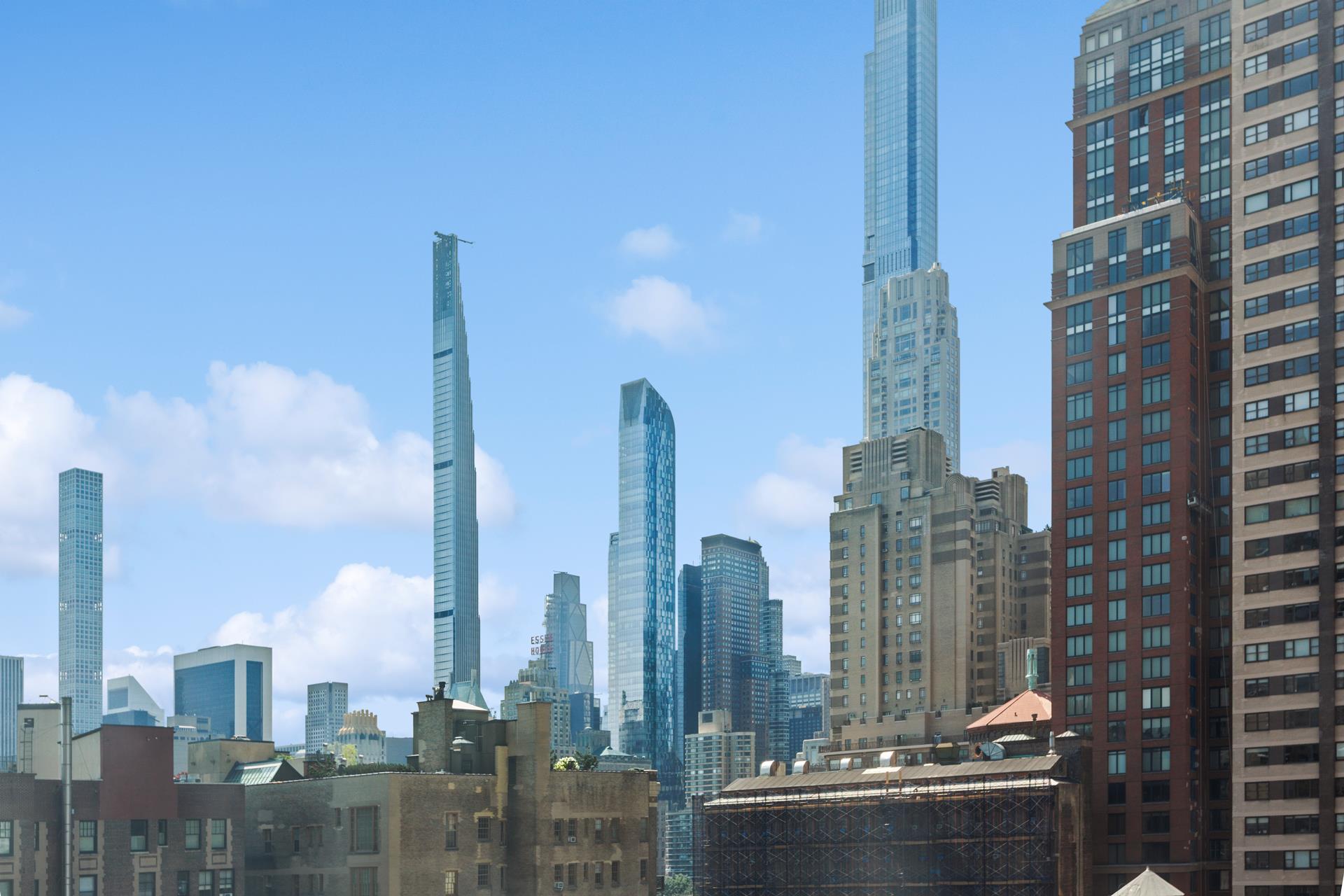 50 West 66th Street, Unit 15E Manhattan, NY 10023 - Photo 2 of 12 a city view with tall buildings