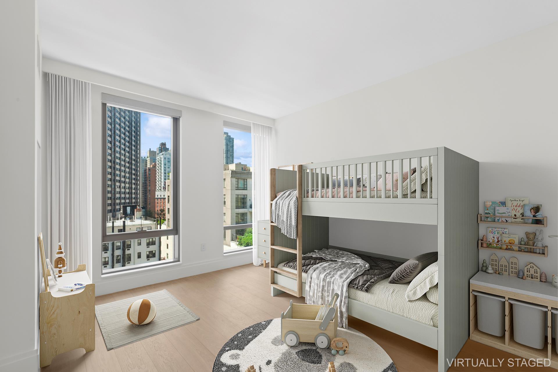 50 West 66th Street, Unit 15E Manhattan, NY 10023 - Photo 9 of 12 a living room with furniture and a flat screen tv