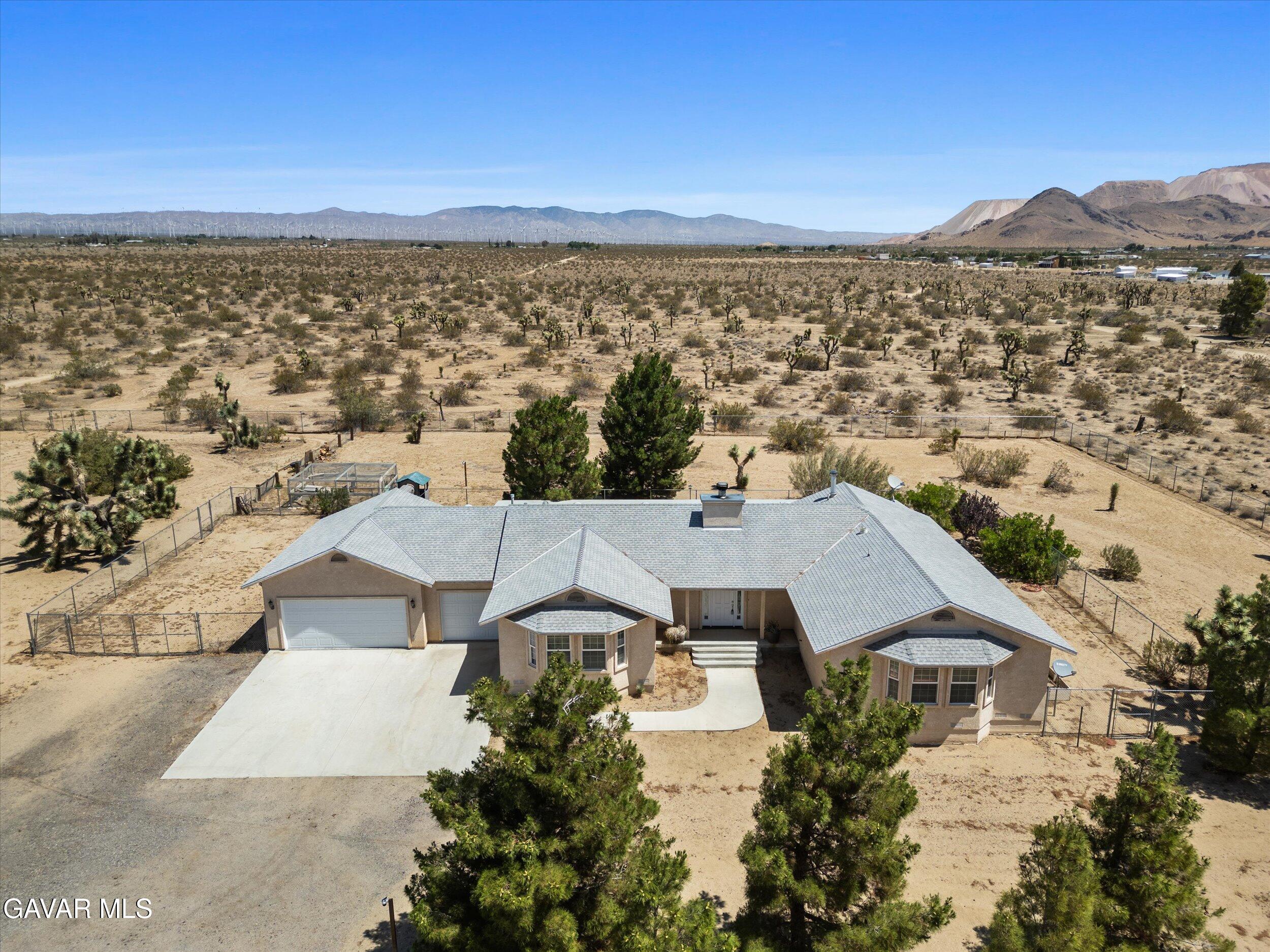 4961 Montiverde Road Mojave, CA 93501 - Photo 3 of 57 an aerial view of residential houses with outdoor space