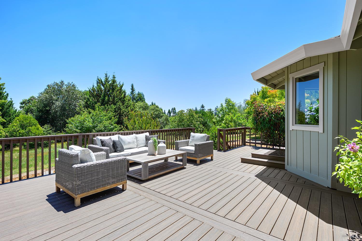 7595 Giusti Road Forestville, CA 95436 - Photo 15 of 41 a balcony with wooden floor and outdoor seating