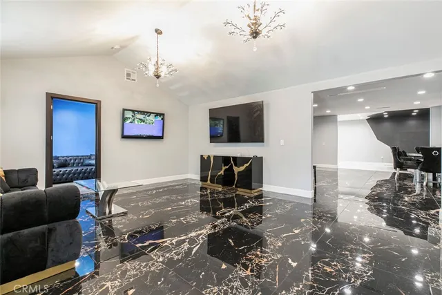 a kitchen with a sink outdoor seating and yard