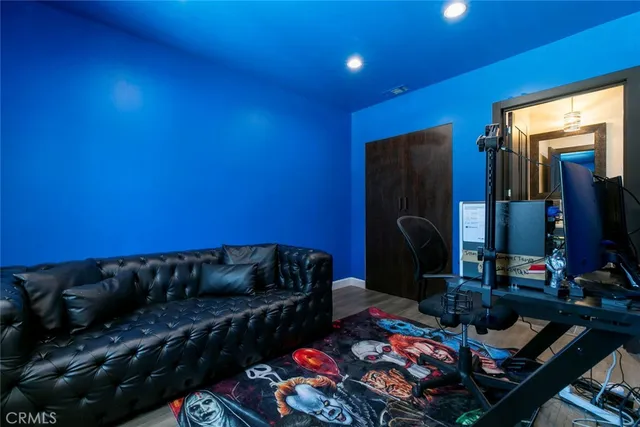 a bathroom with a double vanity sink mirror and toilet