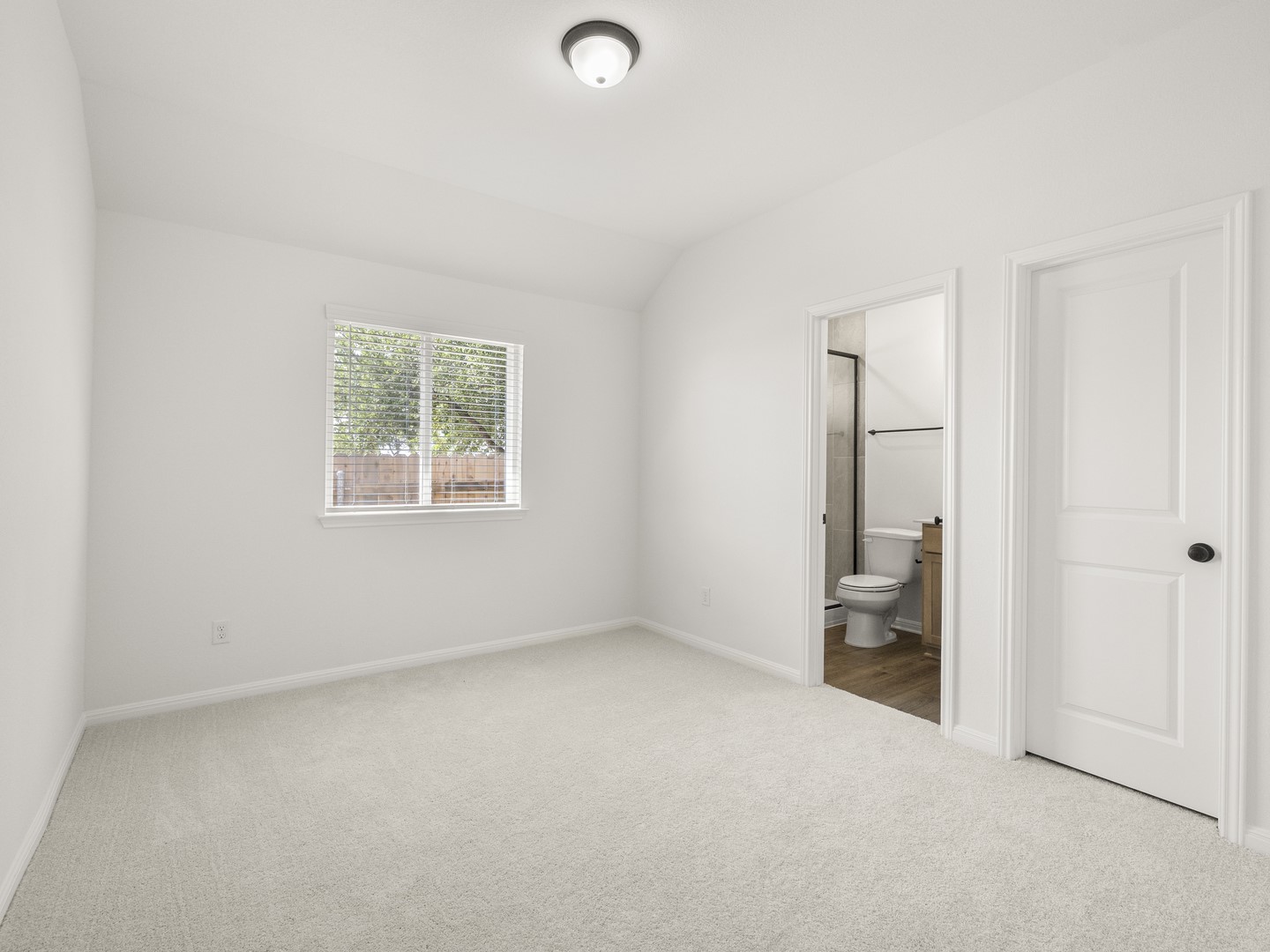 402 Judson Street Bertram, TX 78605 - Photo 17 of 27 an empty room with windows and closet
