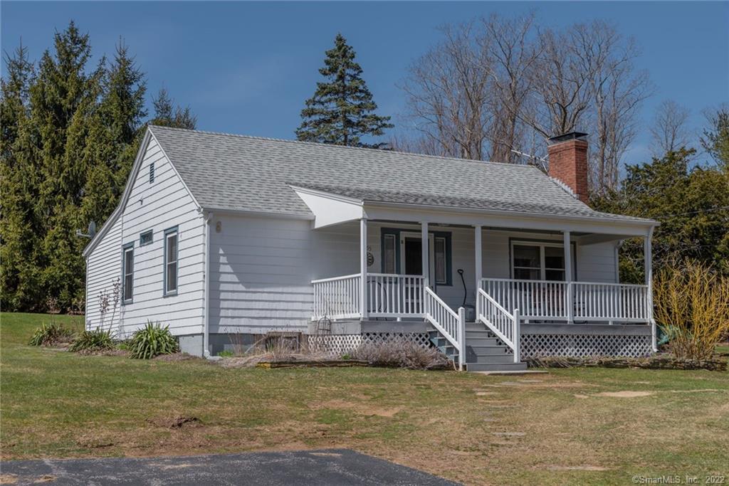 655 West Road Salem, CT 06420 - Photo 1 of 1 a front view of a house with a garden and porch
